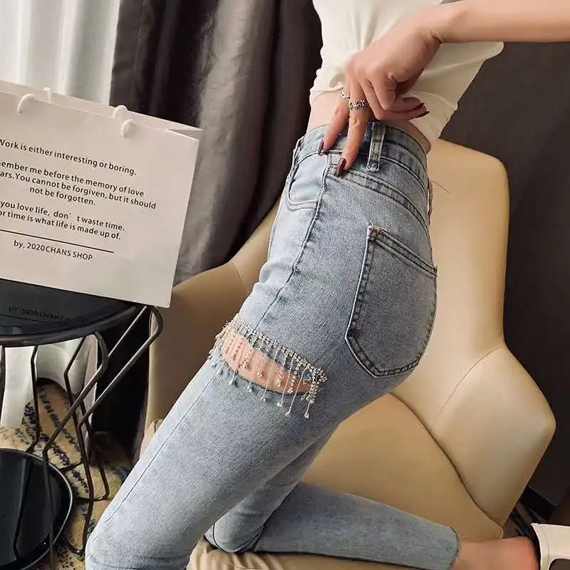 

Женские джинсы с дырками Новинка весна-лето 2023 универсальные эластичные брюки с высокой талией леггинсы капри тонкие