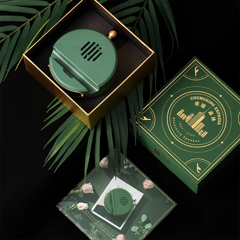 

New Portable Inductive Wireless Bluetooth Speaker Mobile phone holder Fashion household ornaments Metal Loudly Mini Speaker