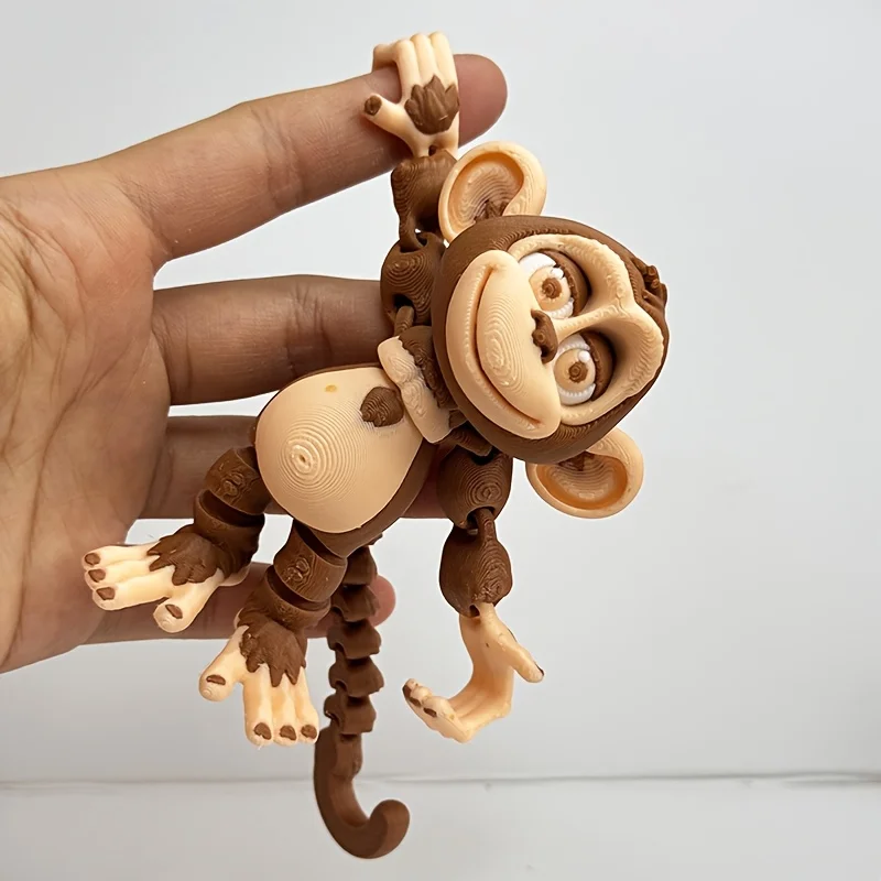 

Многоцветная статуэтка обезьяны