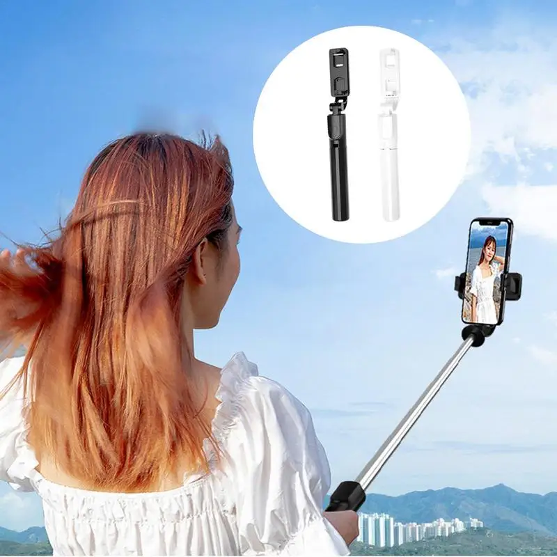 

Latest Wireless Blue Tooth Selfie Stick Extendable Smart Phone Stand Foldable Mobile Tripod Stand For Live Streaming And Videos
