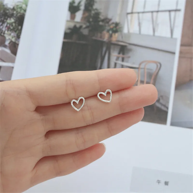 

Fashion Simple Style Mini Hollow Heart Shaped Silver Color Stud Earrings For Women Girls Ear Jewelry Birthday Gifts