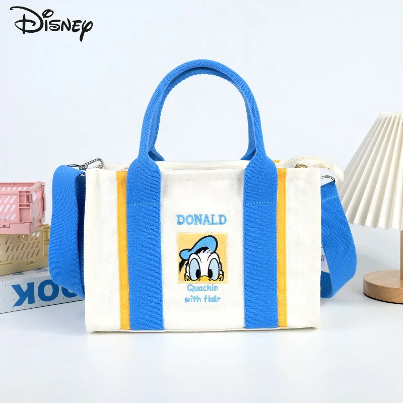 Фото Disney 2026, новая женская сумка через плечо, модная женская сумка через плечо высокого качества с героями мультфильмов, большая вместительная сумка для покупок для девочек №1