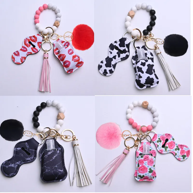 

Silicone Keychain with Hand Sanitzer Holder Tassel Wood Beads Bracelet Keyring for Women Wristlet Key Chain Accessories Cute