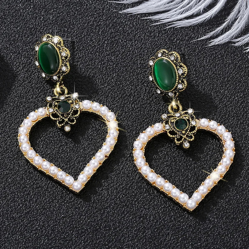 

Retro pearl long earrings net red hot style show face thin all-match personality pearl tassel 2021 trendy earrings