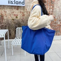 2022 new fashion simple lattice klein blue shoulder bag high capacity student book lady shopping handbag cotton fabric bags