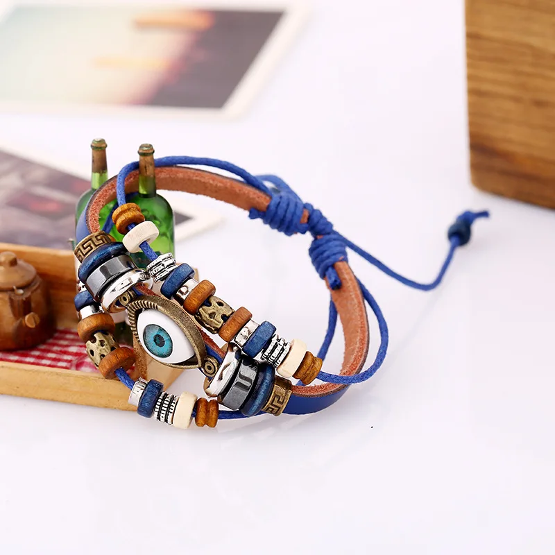

Popular jewelry new beaded eye cowhide bracelet pull adjustment couple leather bracelet European and American jewelry