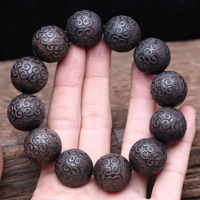 Браслет из натурального черного дерева бусины с узором в виде ключа