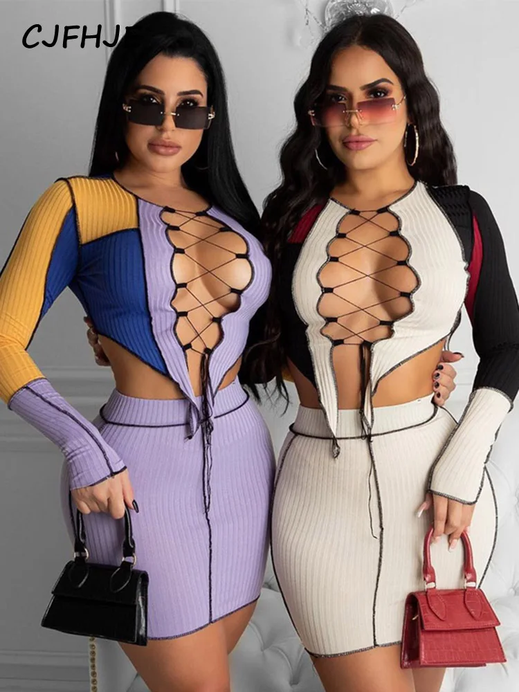 

CJFHJE 2022 Long Sleeve Hollow Out Bandage Patchwork Tshirt Top Skirt 2 Pieces Set Autumn Winter Women Sexy Party Tracksuit