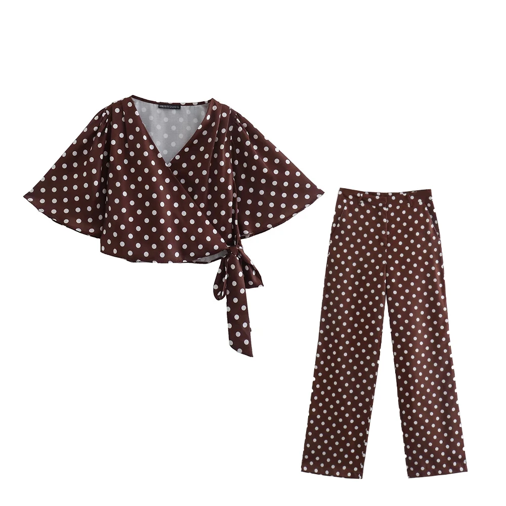 

Женская укороченная блузка в горошек с бантом и V-образным вырезом