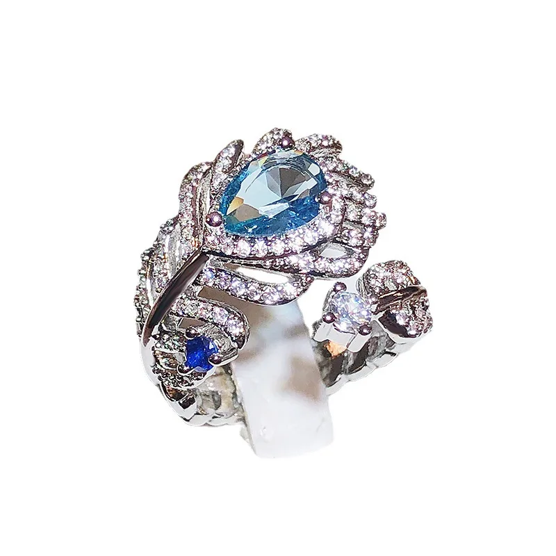Женское кольцо с перьями из циркония регулируемое синим кристаллом