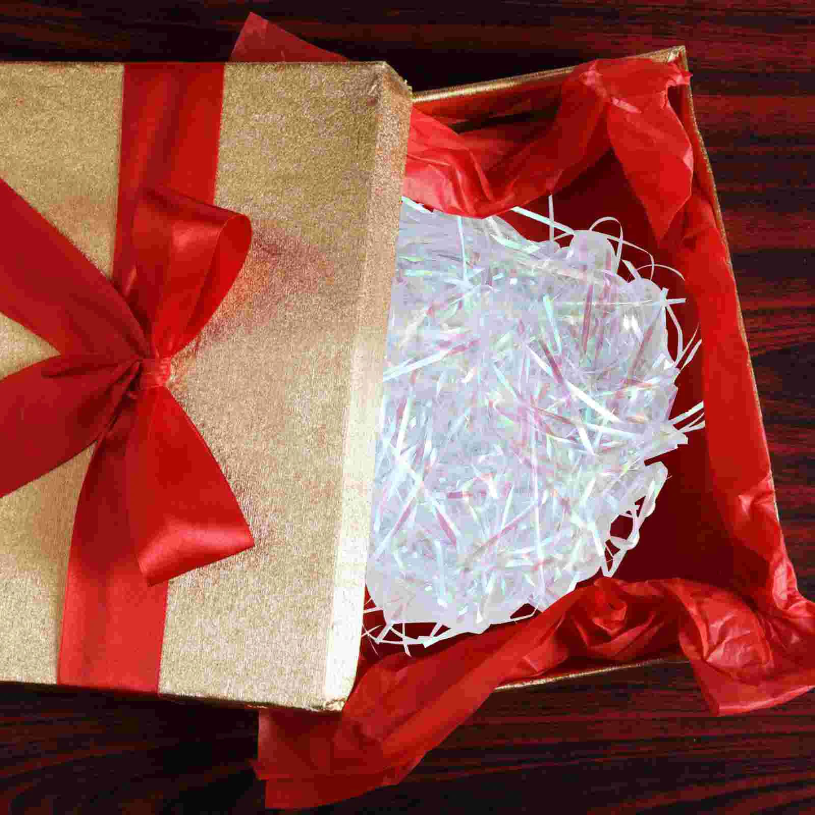 Прозрачная шелковая подарочная коробка из ПЭТ Symphony наполненная измельченной