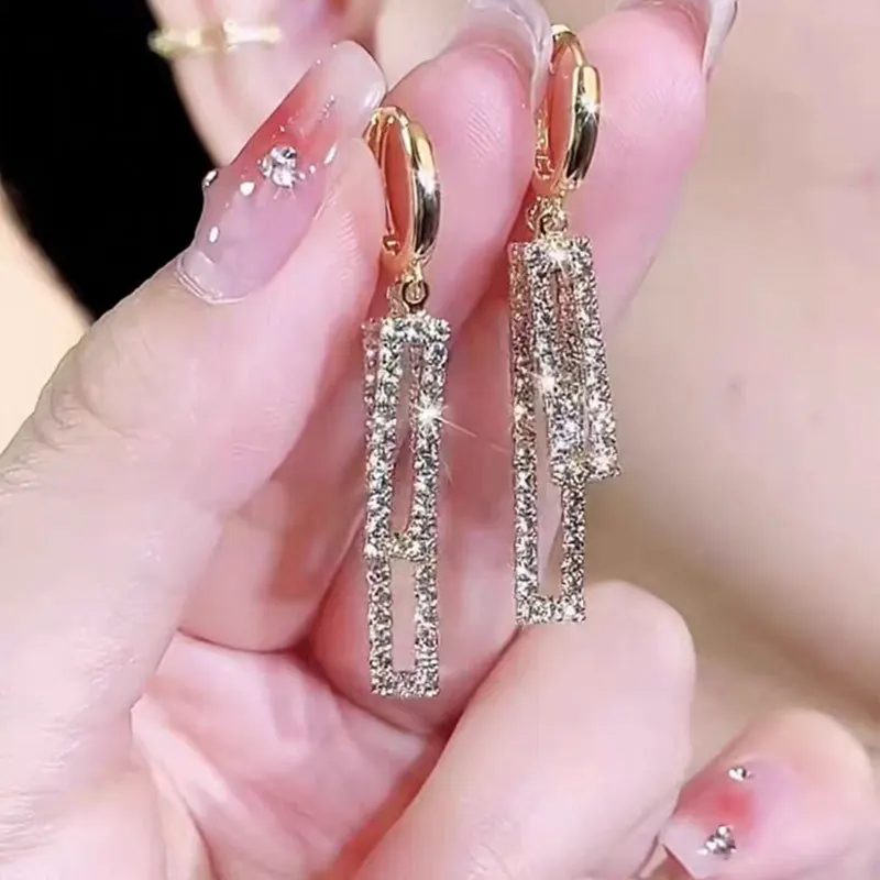 Винтажные висячие серьги золотого цвета с кисточками