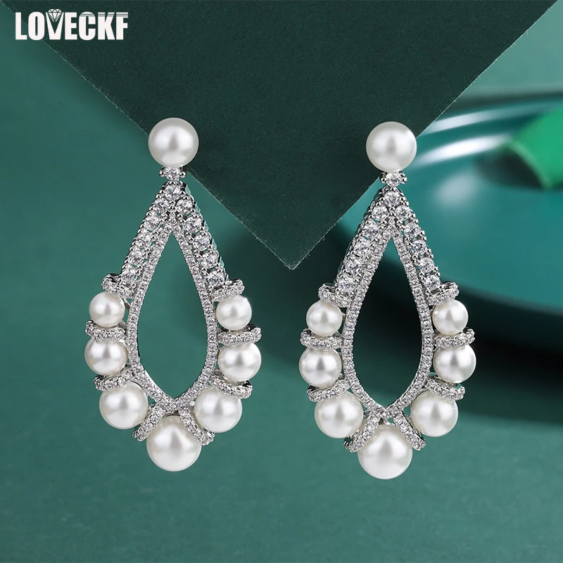 

Новые женские серьги с фианитами и бриллиантами