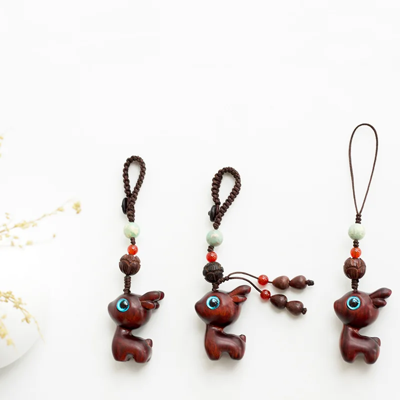 

Cartoon cute sandalwood net red one deer safe men's and women's home car key chain pendant pendant braided mobile phone chain