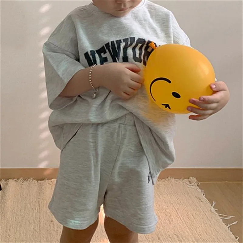 

2022 Girl Simple Comfortable Suit Kid Boy Letter Print Loose Short Sleeve T-shirt + Children Casual Soft Cotton Shorts 2pc Set