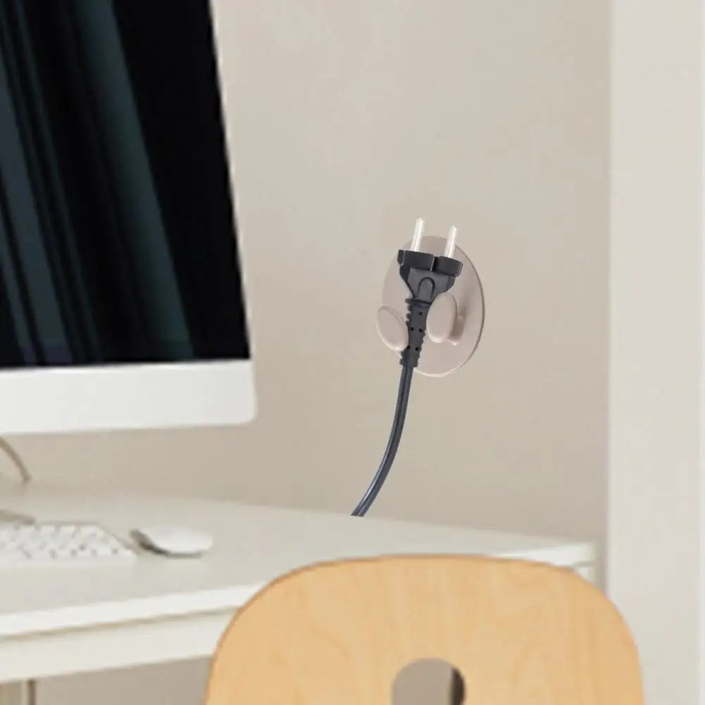 

Без усилий организует шнуры с клейкими держателями вилок для использования в кухне, спальне, ванной, общежитии