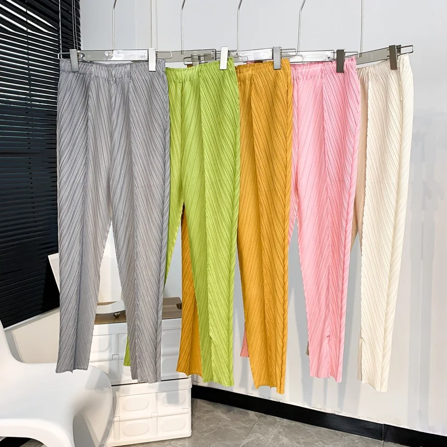

Miyake pleated casual pants women's high waist temperament all-match nine-point pants design sense niche all-match tapered pants