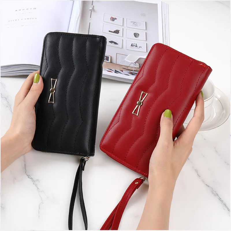 

Женский кошелек из искусственной кожи, длинный стильный однотонный простой бумажник на молнии с бантом и отделением для карт, большой вмест...