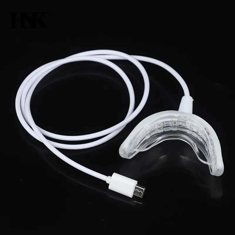 

Портативный прибор для отбеливания зубов с сисветильник светодиодом и USB-зарядкой