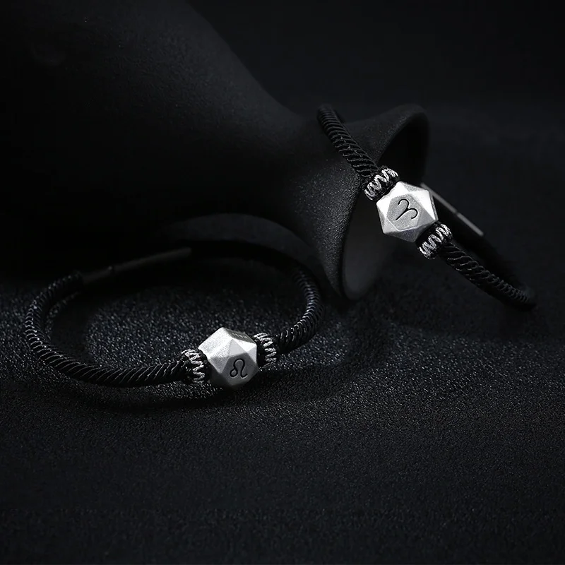 Серебряный браслет с подвеской зодиака из черной веревки