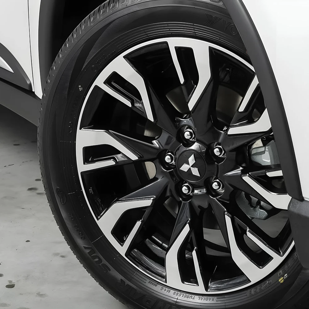 Фото Наклейки-эмблемы на центральные колпачки колесных дисков 56/60 мм для Mitsubishi Eclipse, Lancer, Pajero, ASX, Colt, I200, Space, Delica №5