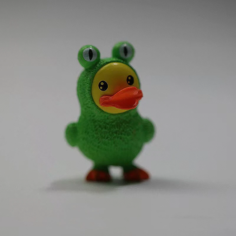 

4Pcs/Set Anime Cartoon Little Yellow Duck Animal Doll Action Toy Figures Miniature Toy Micro Landscape