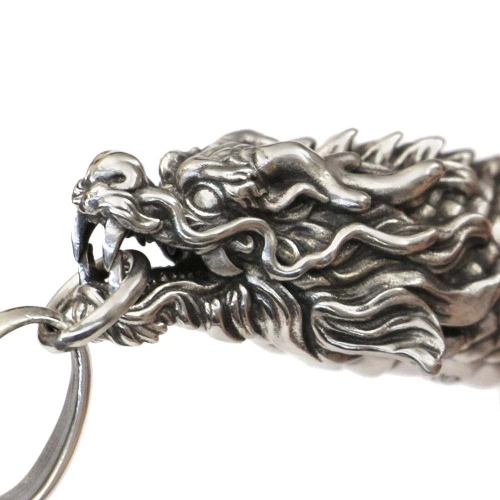 _ Серебряная подвеска в виде рыбки с изображением дракона что означает Улучшение