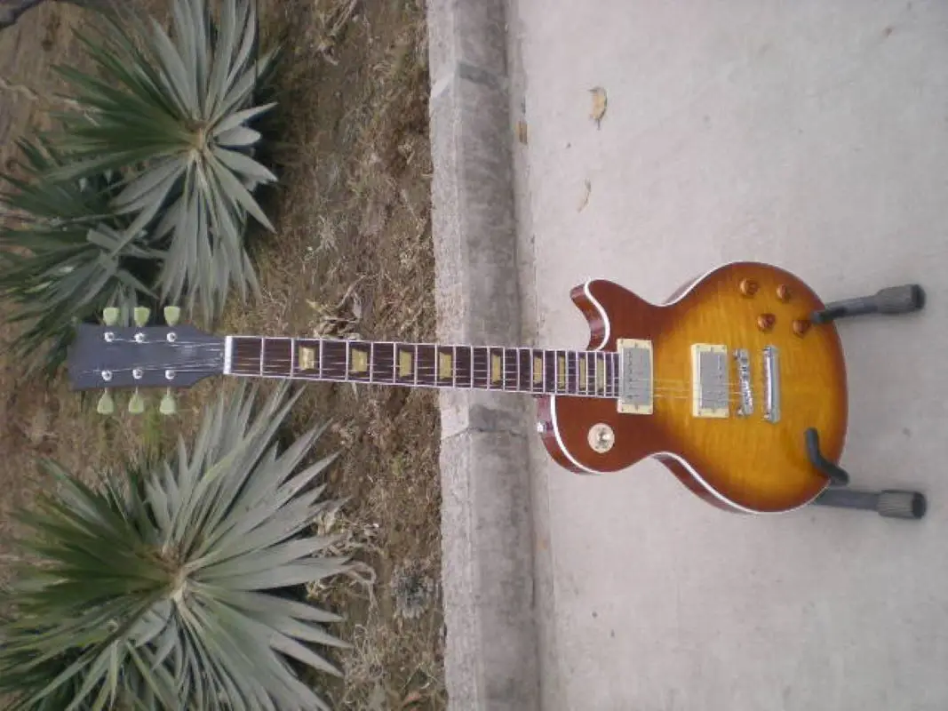 

Inlay Yellow Acrylic Electric Guitar Flame Maple Top Tea Burst