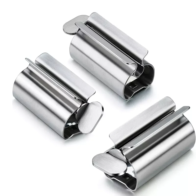 

2022New Accessories Set Rolling Toothpaste Squeezer Tube Stainless Steel Toothpaste Dispenser Toothpaste Cosmetic Storage Rack