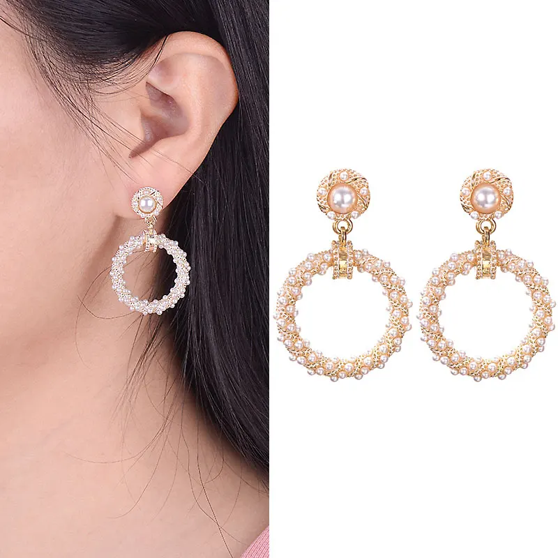 

Simple medium and long fashion Korean version of the oversized white pearl 925 silver needle earrings for women's jewelry