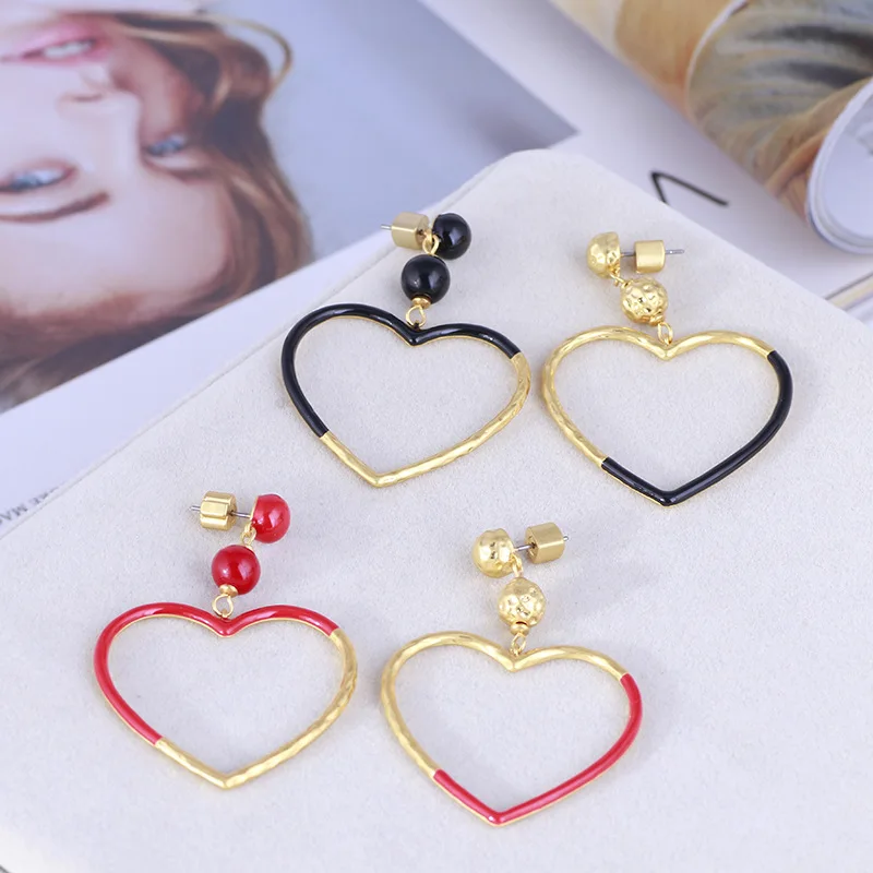 

European And American Trend Jewelry Wholesale Fashion Hollow Love Asymmetric Earrings Women
