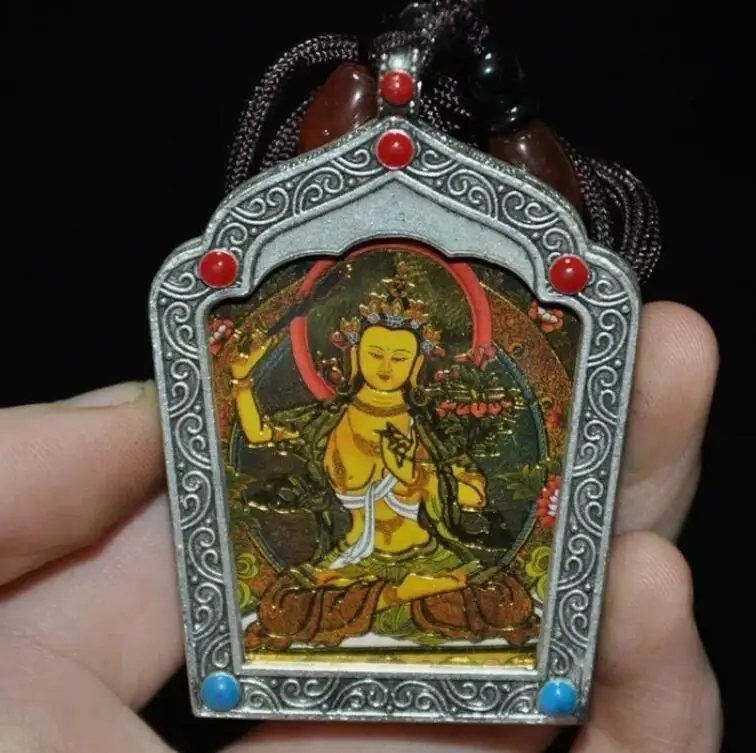 

Буддийская подвеска из меди с тибетским серебряным камнем