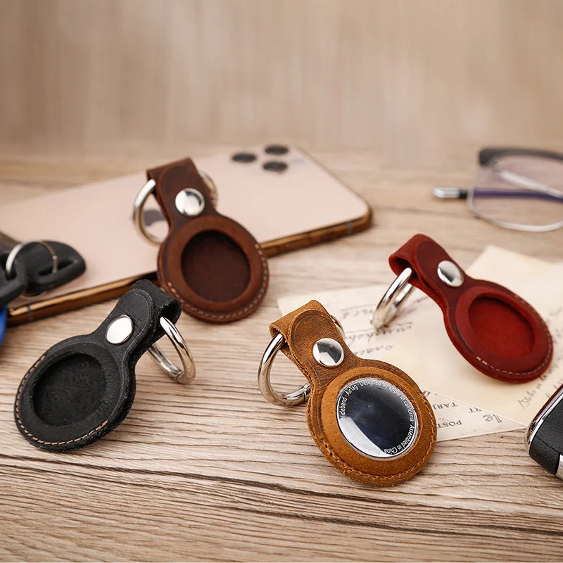 

Airtag Tracker Keychain Genuine Leather Airtag Case Student Key Pet Anti Lost Locator Protective Sleeve Retro Cowhide Small Gift