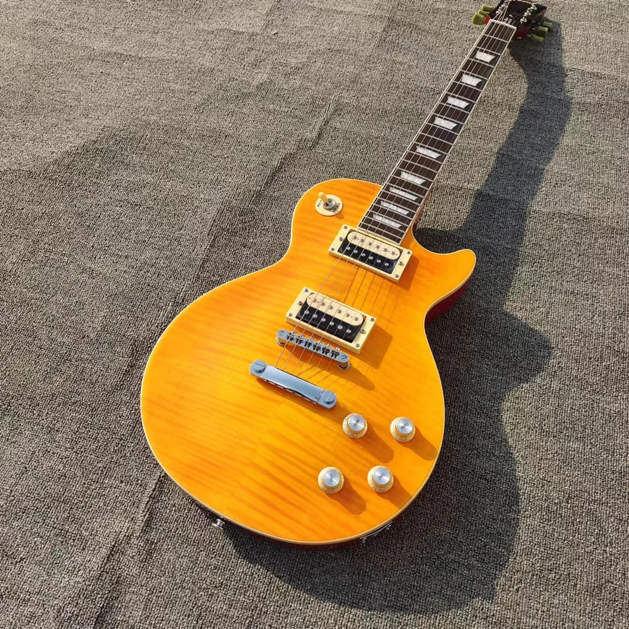 

Electric guitar, yellow tiger pattern, mahogany, rosewood fingerboard, quick package mail