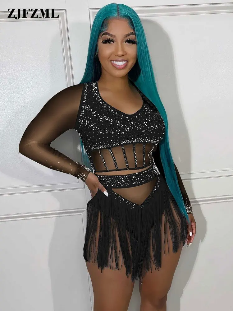 

Сетчатый женский костюм из двух предметов, сексуальные женские спортивные костюмы, Прозрачные топы с длинным рукавом и комбинированная танцевальная мини-юбка с кисточками