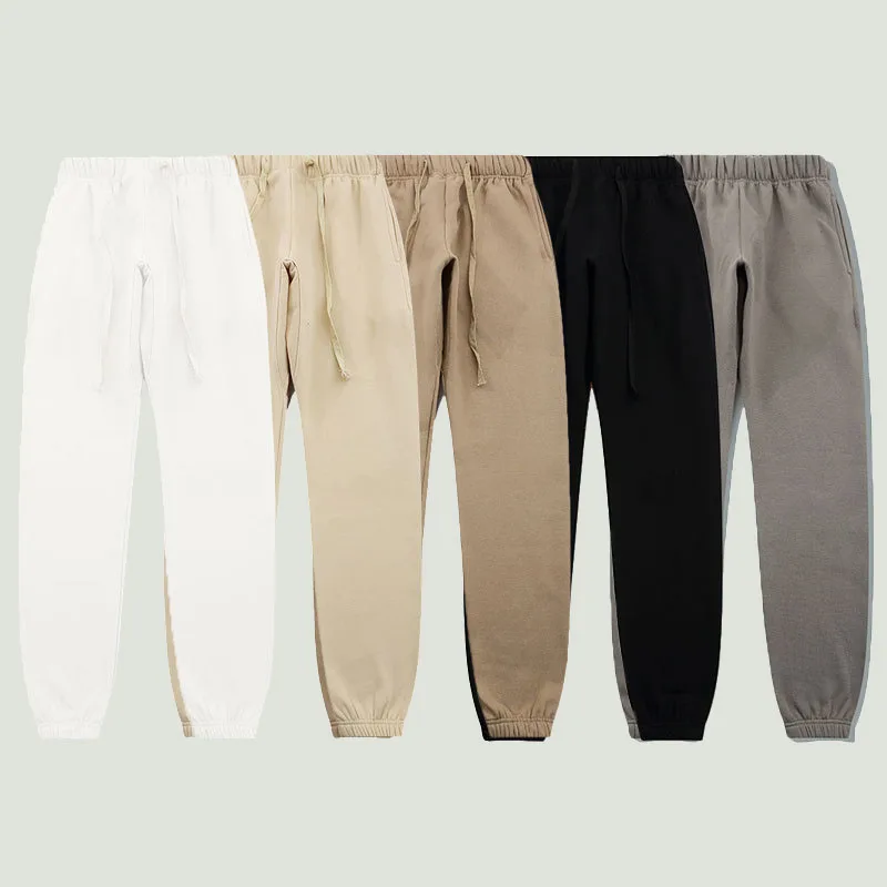 New Brand Streetwear Letter Printed Sweatpants Men Hip Hop Loose Solid Color Casual Cotton Elastic Waist Pants Couples Trousers
