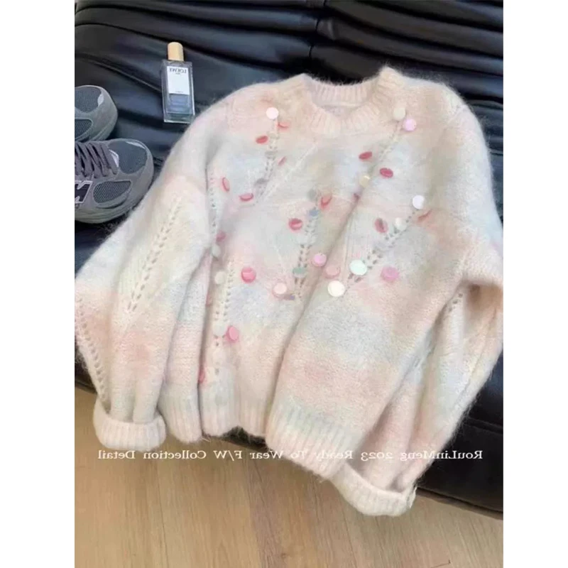 Женский трикотажный свитер с блестками