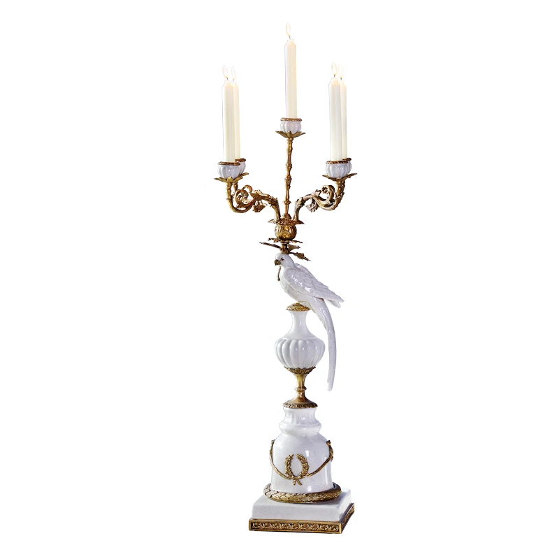 

Interior home decor ceramic candlestick made of porcelain and bronze fittings inspired by a vintage design parrot candle holder