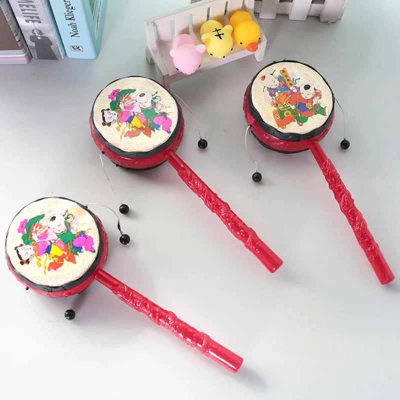 

Детские Мультяшные пластиковые традиционные китайские строительные веселые игрушки, ручной Колокольчик для раннего детства, музыкальная ...