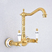 polished gold color brass bathroom kitchen sink basin faucet mixer tap swivel spout wall mounted dual ceramic handles msf612