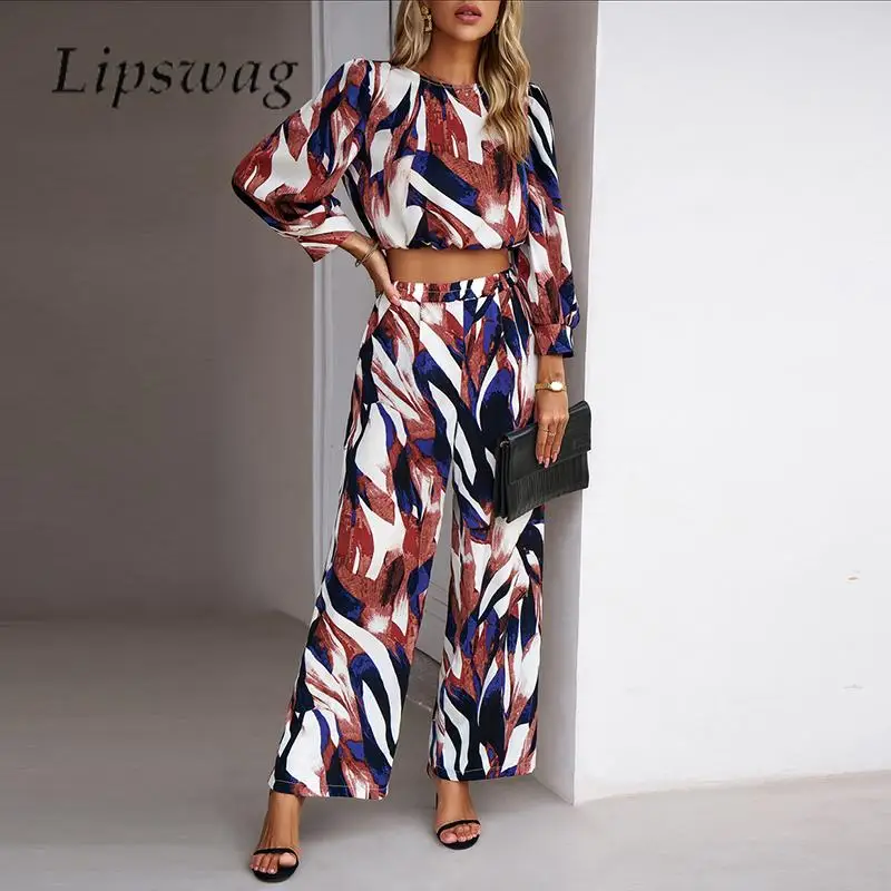 

Женский Повседневный костюм с принтом листьев, Осенний топ с круглым вырезом и длинными рукавами, брюки, комплект из двух предметов, Женский костюм с прямыми брюками с эластичным поясом и карманами