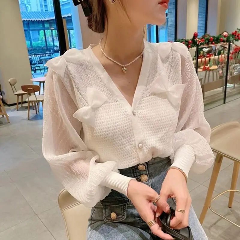 

2022 Spring And Autumn New Fashion Bowknot Splice Yarn Sleeve Knitted Cardigan Women's V-neck Top