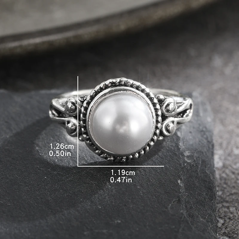 Женское кольцо с искусственным жемчугом серебристое