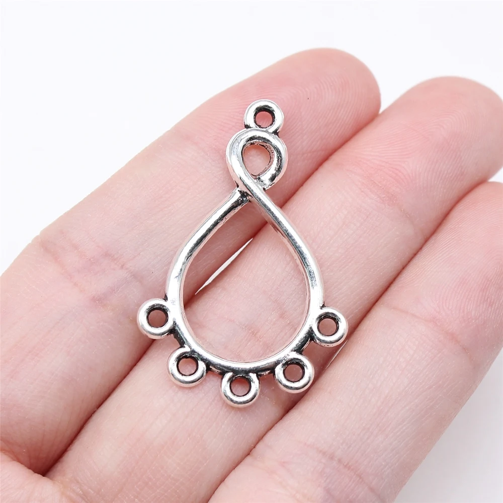

WYSIWYG 10pcs 34x22mm Antique Silver Color Cutout Twisted Drop Earring Attachments For Jewelry Making