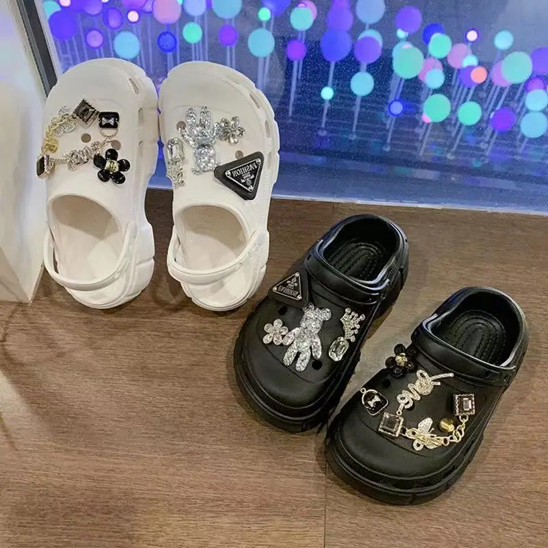 

Children's Slippers 2023 Summer New Girls' Cartoon Thick Sole Anti Slip Baotou Hole Shoes Girls Wear Beach Sandals Outside