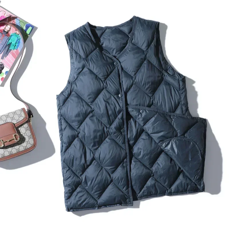 Женский ультратонкий пуховик в корейском стиле с теплой подкладкой и застежкой