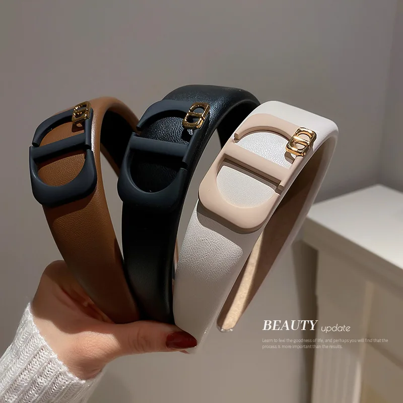 

Korea East Gate Leather Letter Headband, Retro Simple, Wide Edge Press Hair Fashionable Personality, Versatile