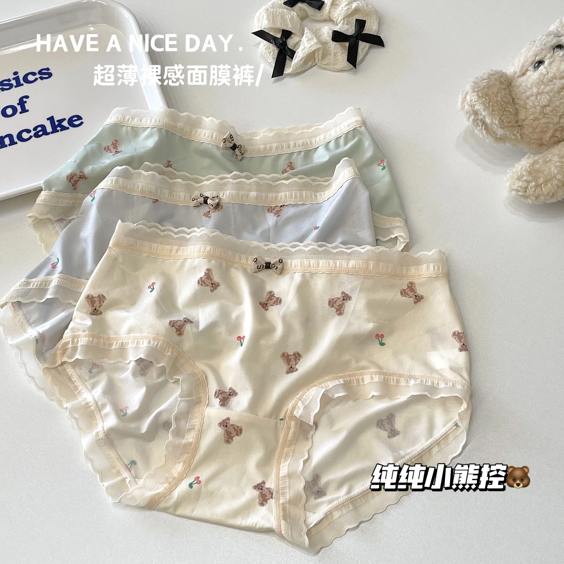 Traceless ultra-thin ice silk underwear girl cute bear print breathable underwear cotton crotch waist bag hip briefs ladies