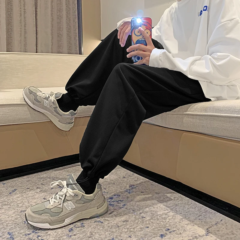 

Однотонные брюки, мужские весенние свободные леггинсы, спортивные брюки, Корейская версия модных повседневных брюк, весна и осень для мужчи...