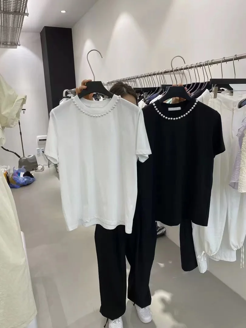 Женская свободная футболка с бусинами